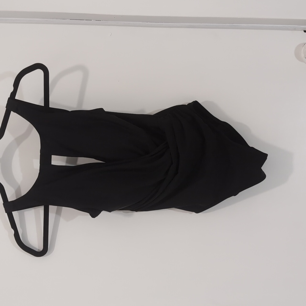Black size 8 miracle suit purchased at Dillard's